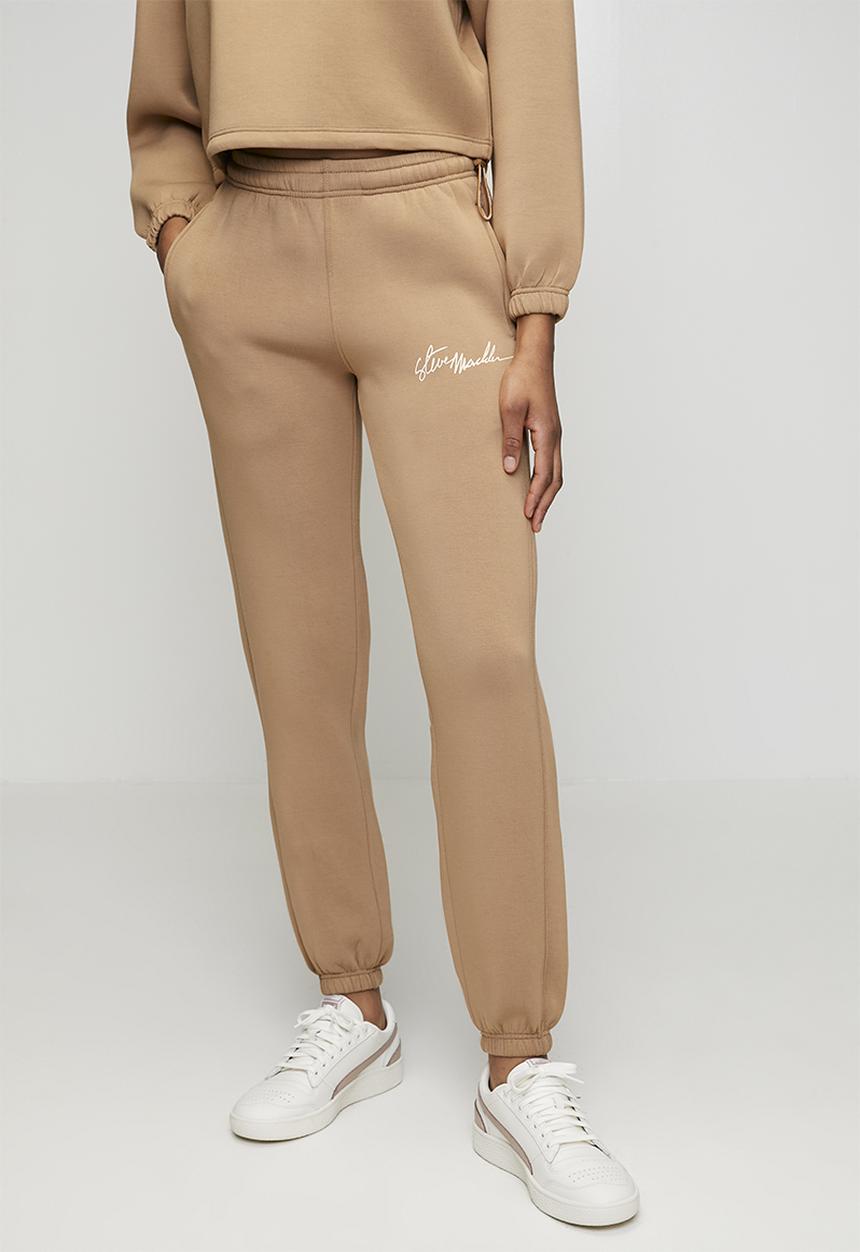 Steve Madden - Ladies brittany slim scuba jogger - mid caramel