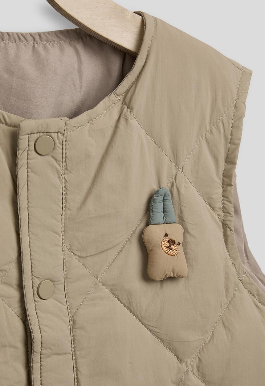 Pop Candy - Diamond quilted collarless vest - sand brown