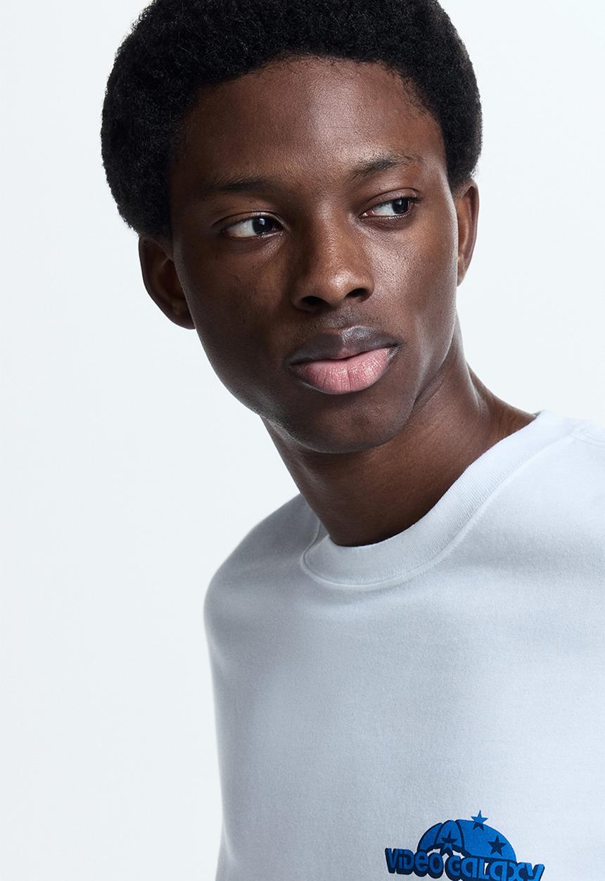 H&M - Loose fit printed T-shirt - white/video galaxy