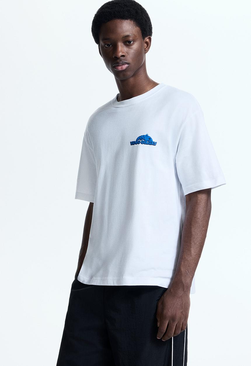 H&M - Loose fit printed T-shirt - white/video galaxy