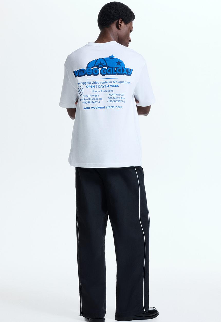 H&M - Loose fit printed T-shirt - white/video galaxy