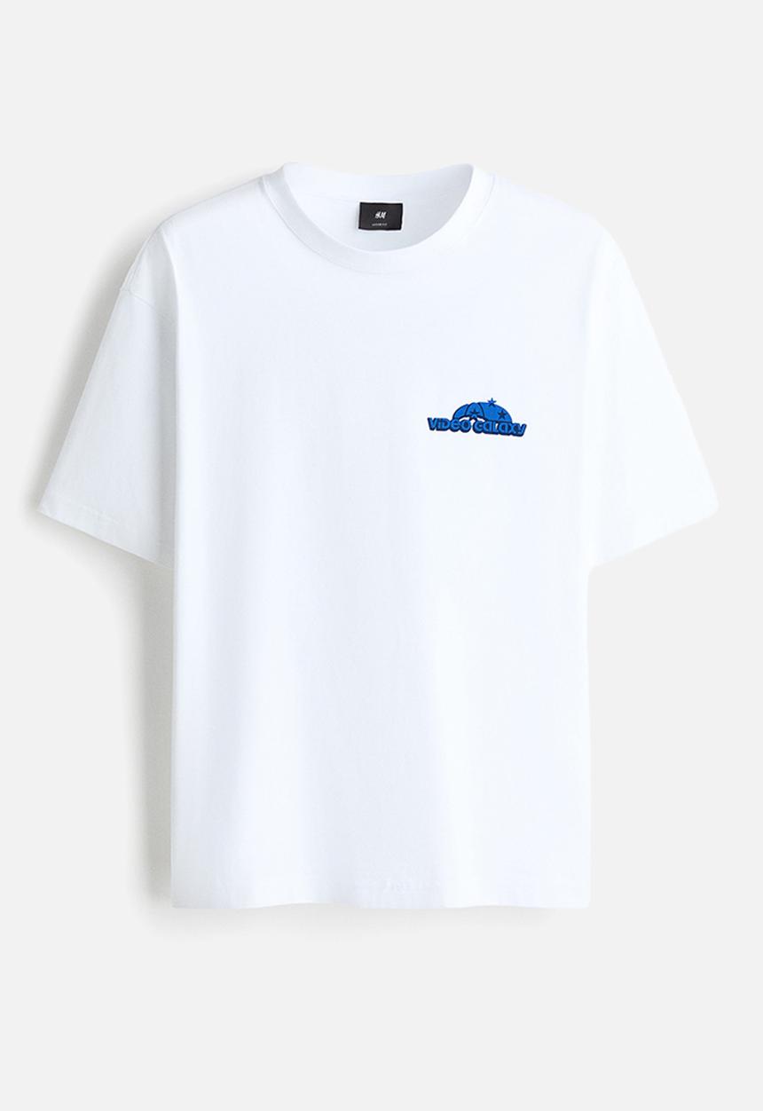 H&M - Loose fit printed T-shirt - white/video galaxy