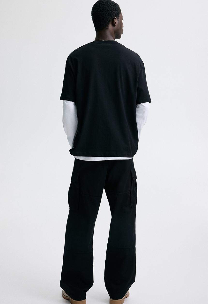 H&M - Loose fit printed t-shirt - black/golden sunset
