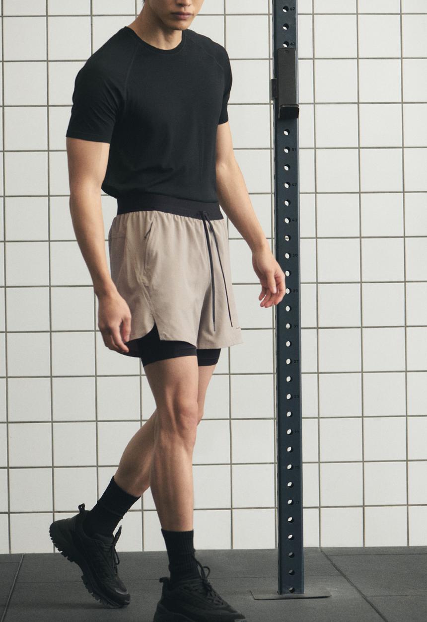 H&M - Double-layered sports shorts with drymove™ - beige/black