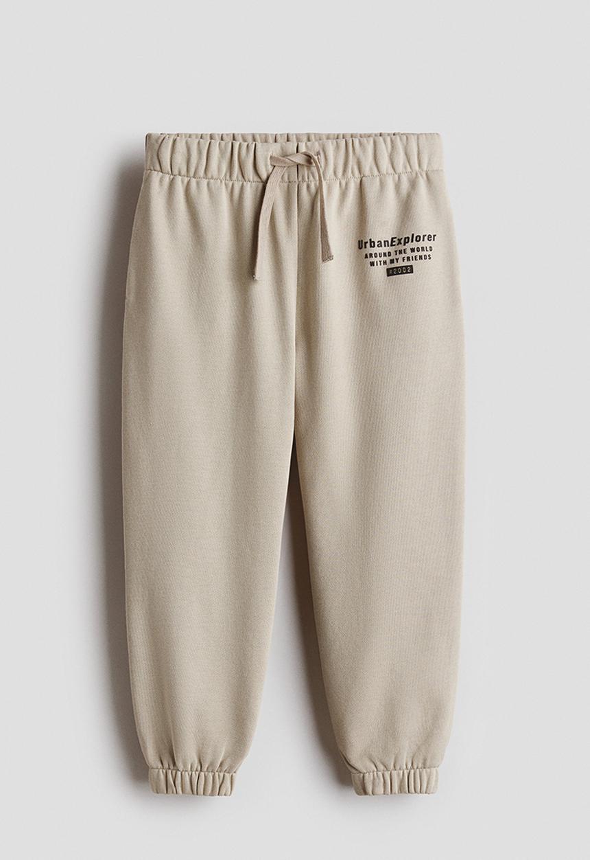 H&M - Motif-detail joggers - beige/urban explorer