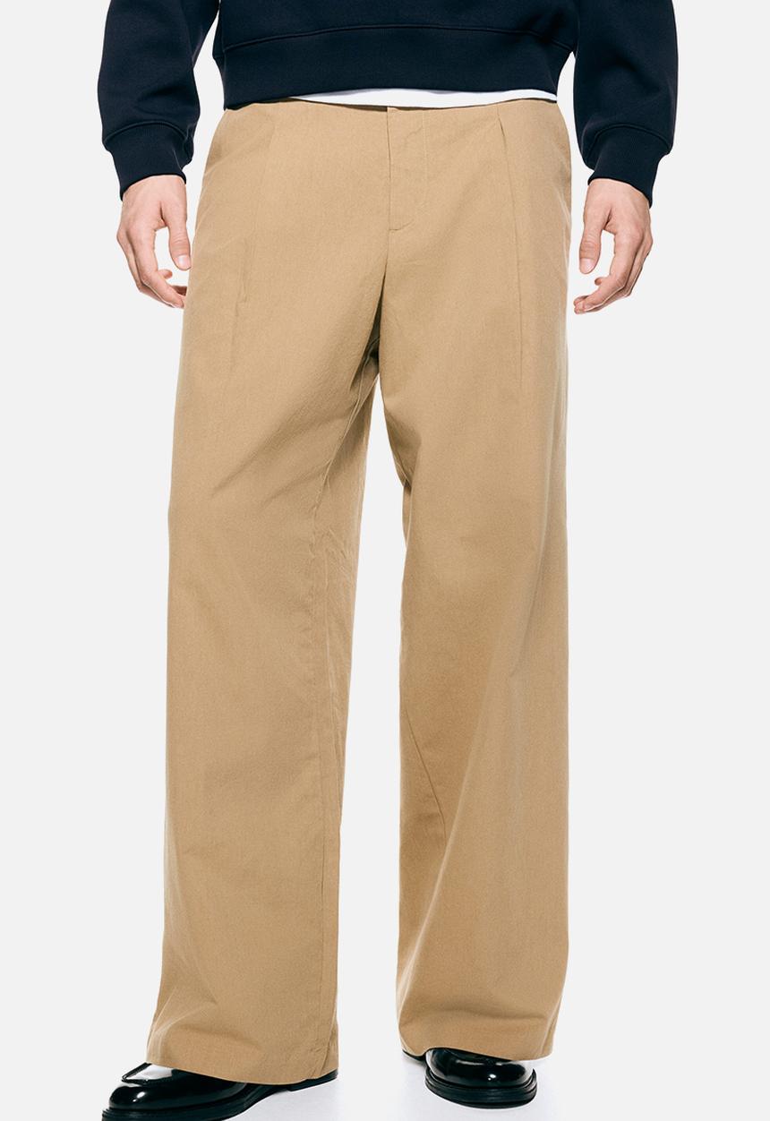 H&M - Loose fit tailored trousers - beige