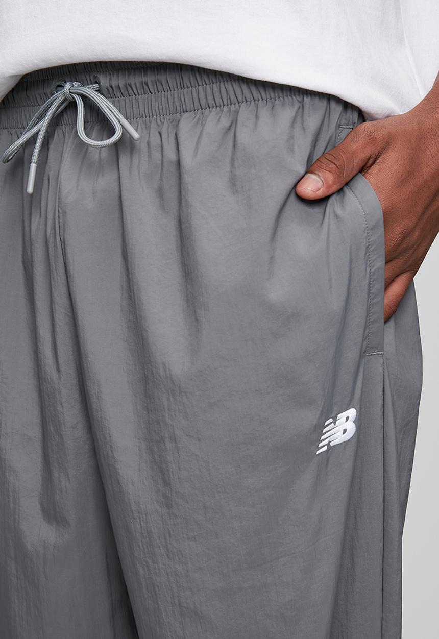 New Balance  - NB Athletics Sport Legacy Pant - Grey