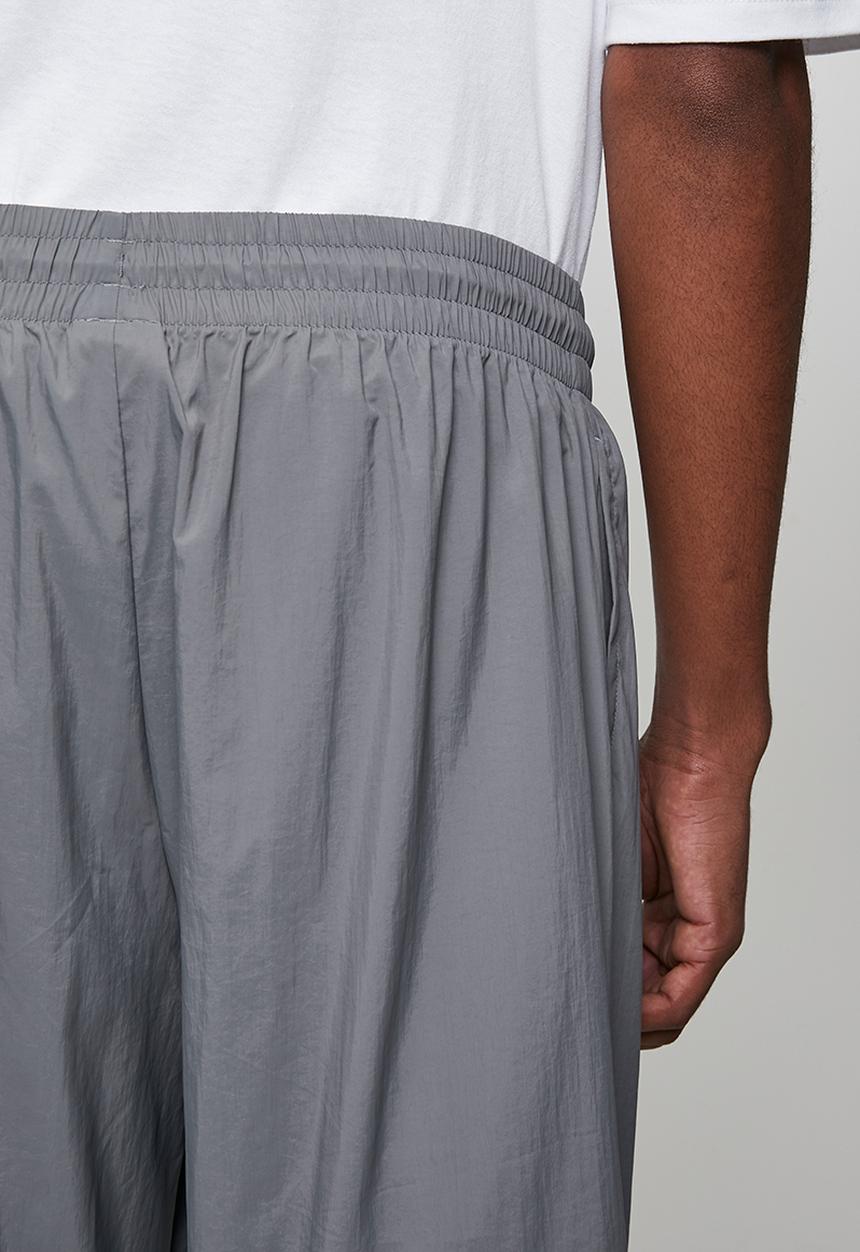 New Balance  - NB Athletics Sport Legacy Pant - Grey