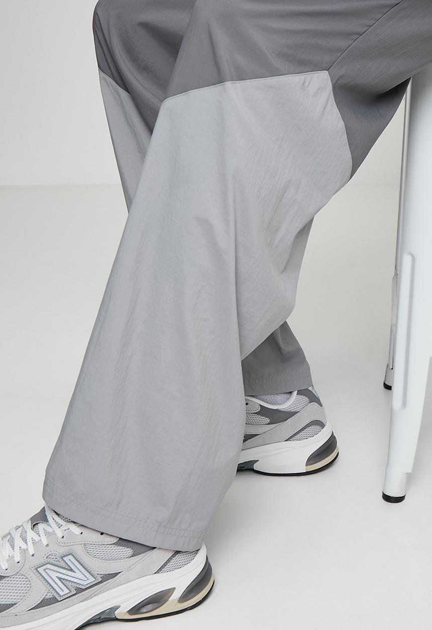 New Balance  - NB Athletics Sport Legacy Pant - Grey