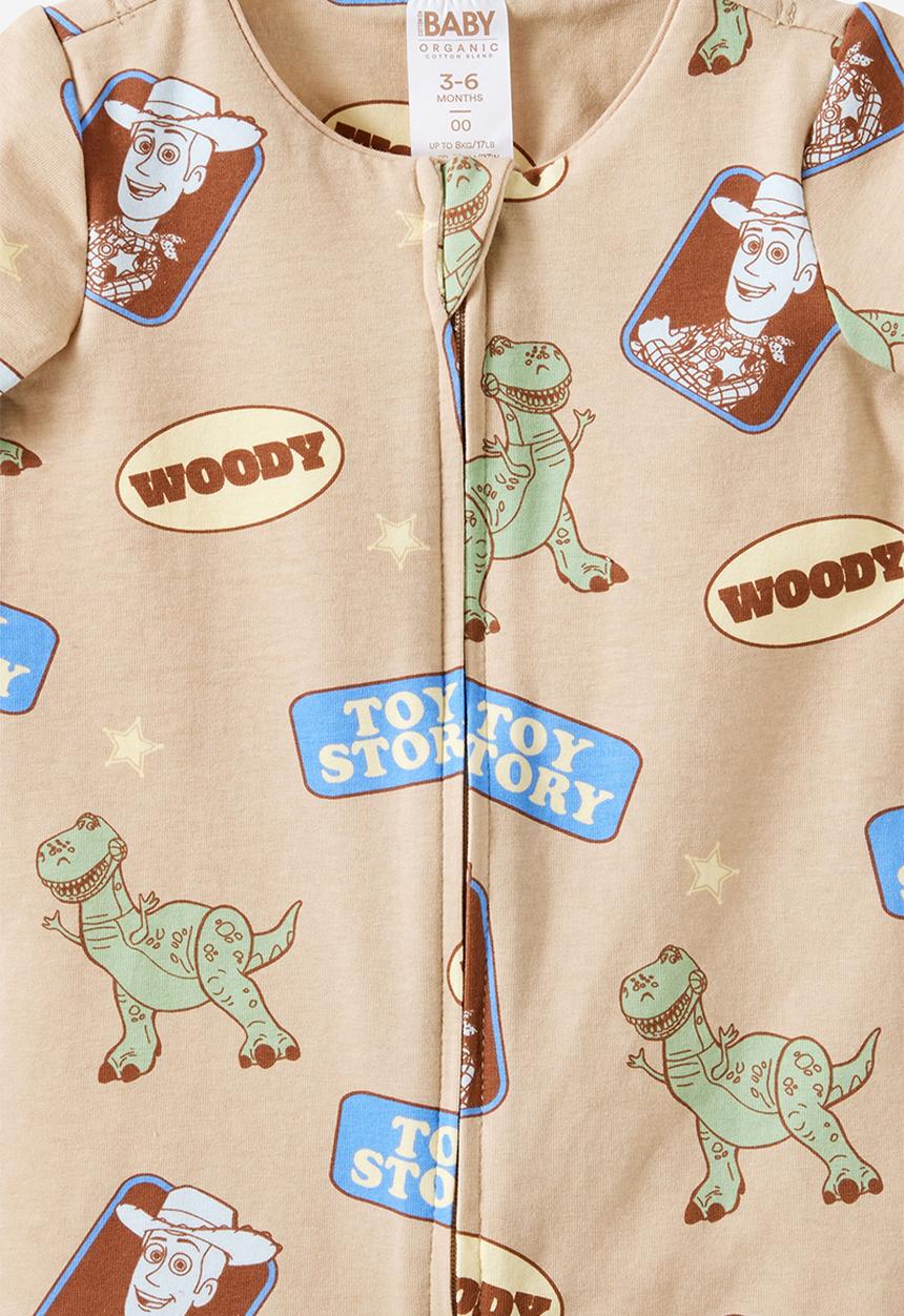 Cotton On - The Short Sleeve Zip Romper License - Lcn Dis Latte Cream/Woody & Friends
