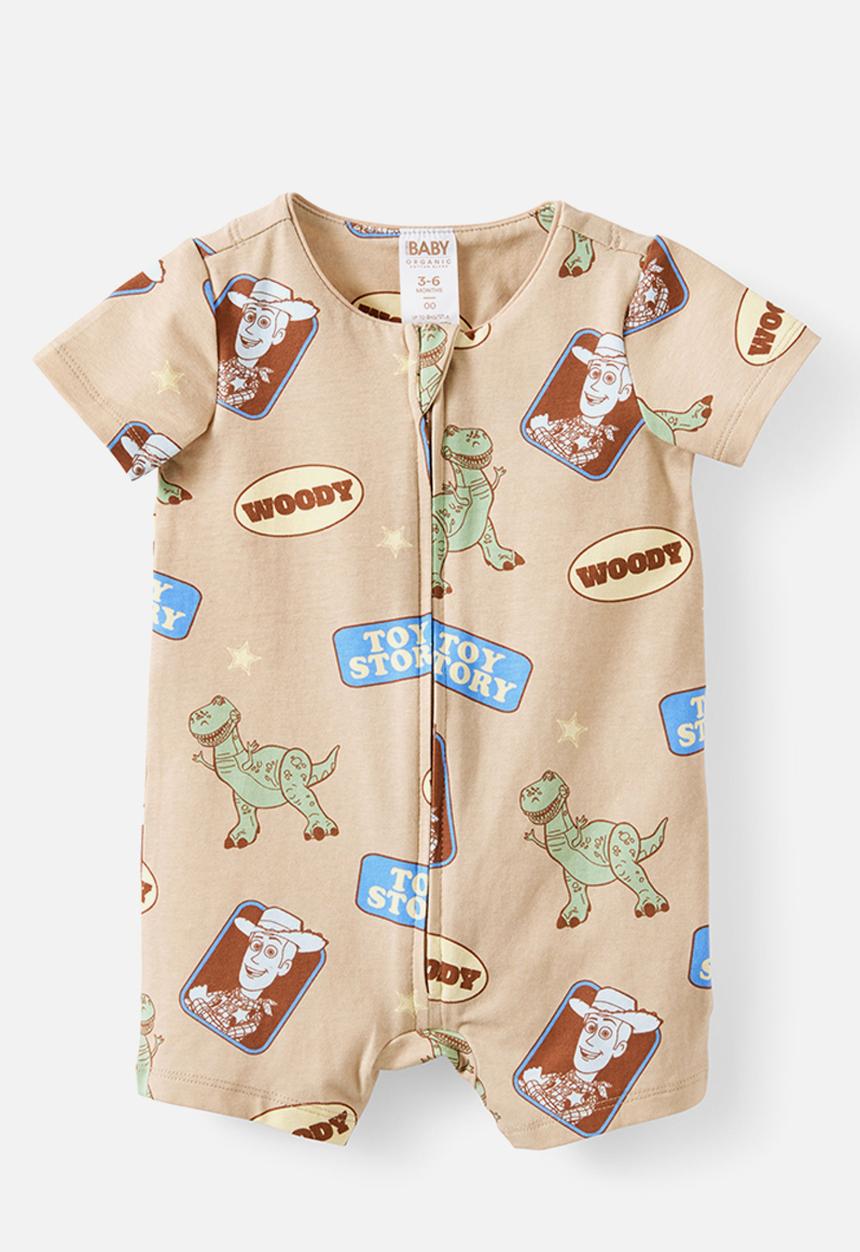 Cotton On - The Short Sleeve Zip Romper License - Lcn Dis Latte Cream/Woody & Friends