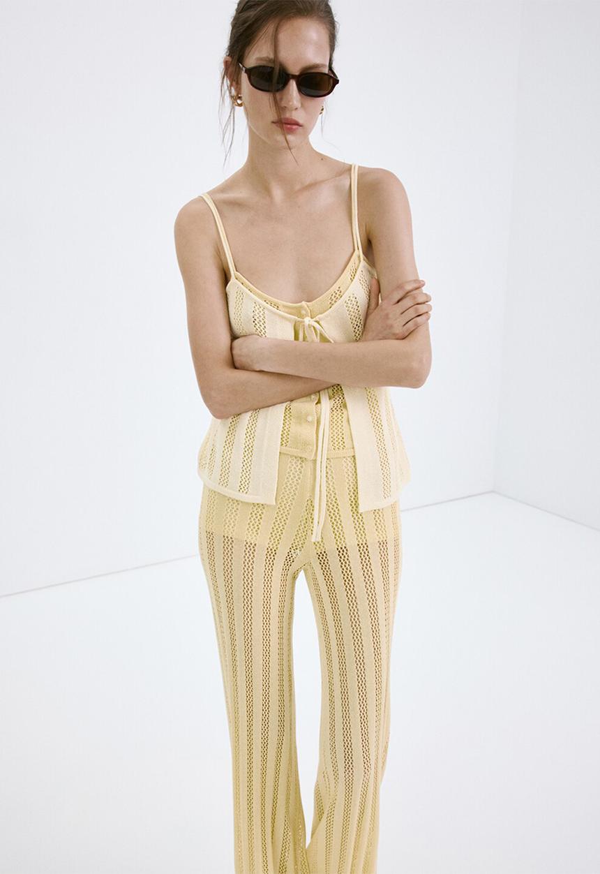 MANGO - Trousers lolai - light/pastel yellow