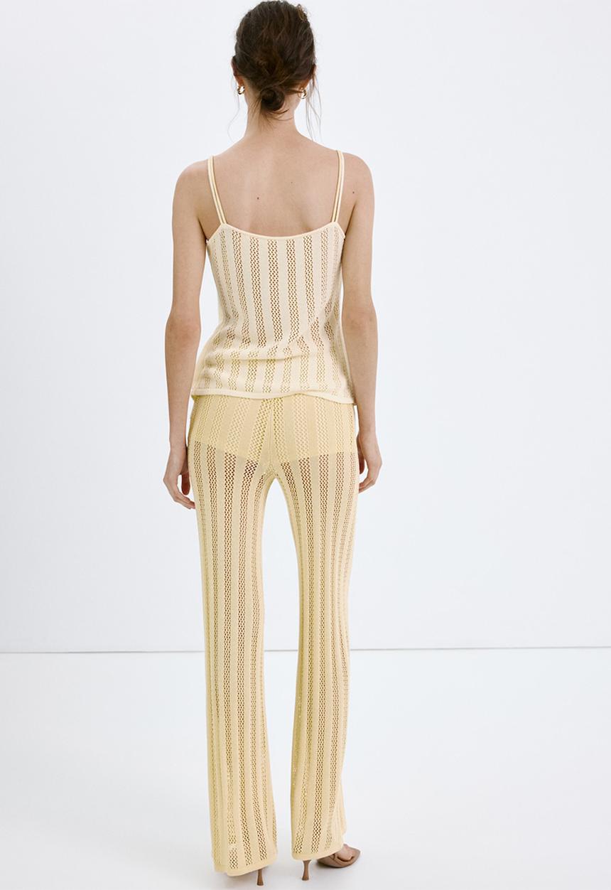 MANGO - Trousers lolai - light/pastel yellow