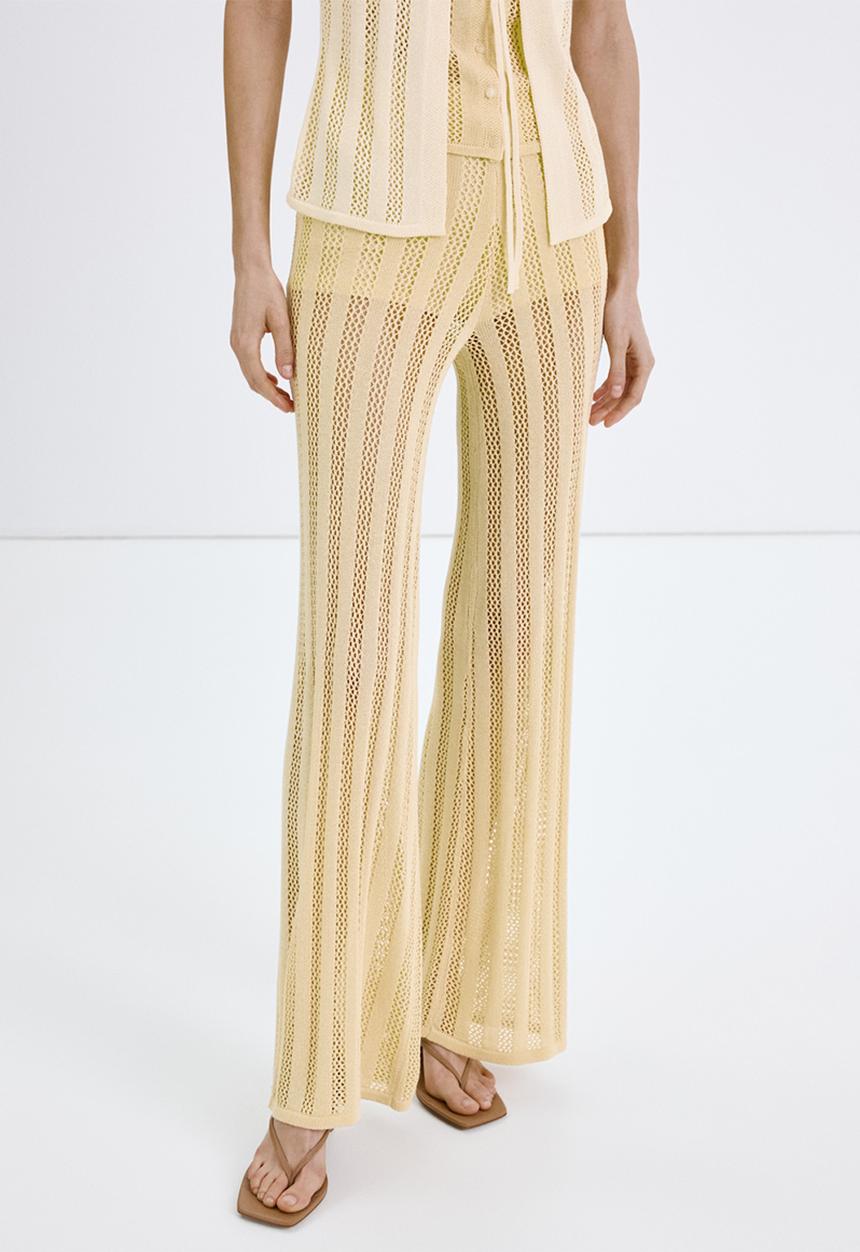 MANGO - Trousers lolai - light/pastel yellow