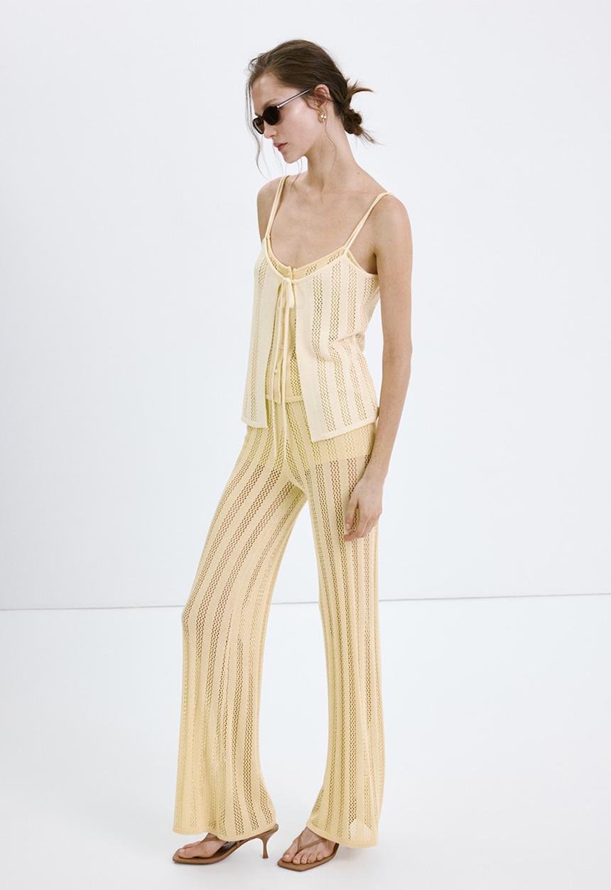 MANGO - Trousers lolai - light/pastel yellow