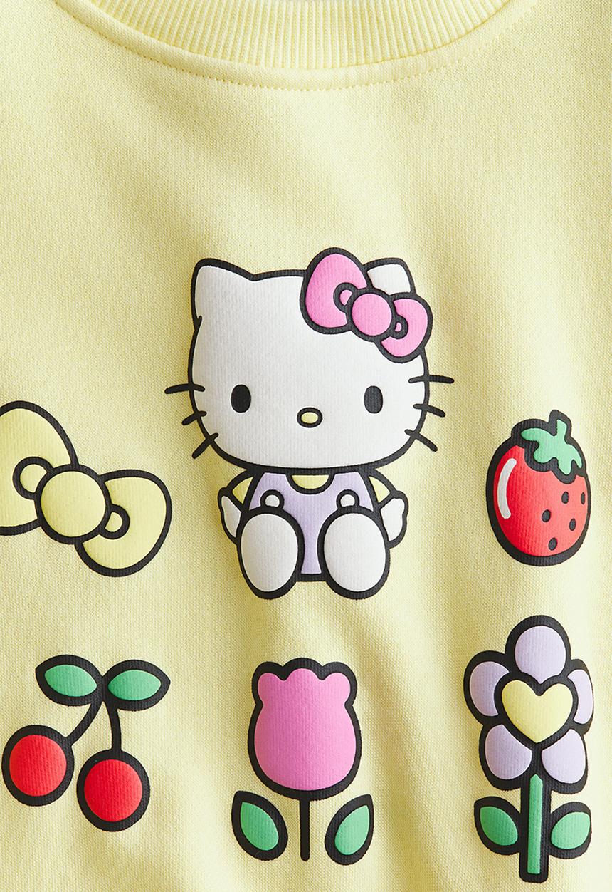 H&M - Printed sweatshirt - yellow/hello kitty