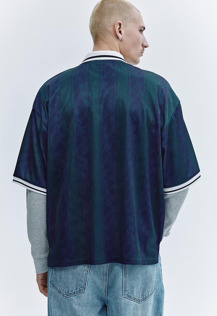 H&M - Loose fit football shirt - dark blue/run wild