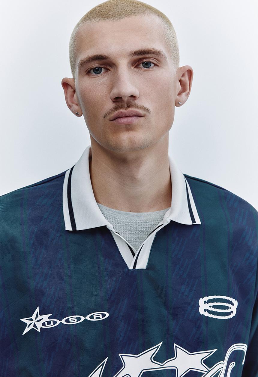 H&M - Loose fit football shirt - dark blue/run wild