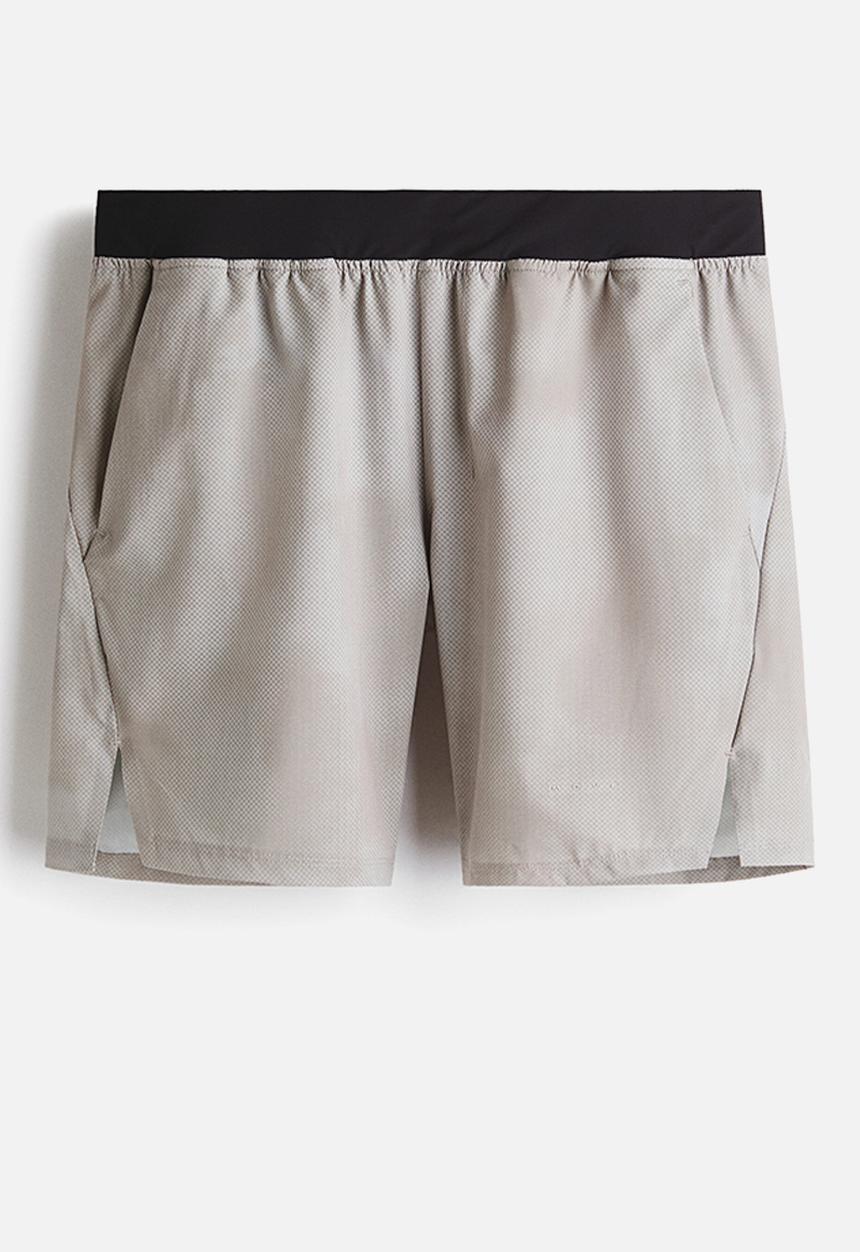 H&M - Mid-length sports shorts with drymove - light beige