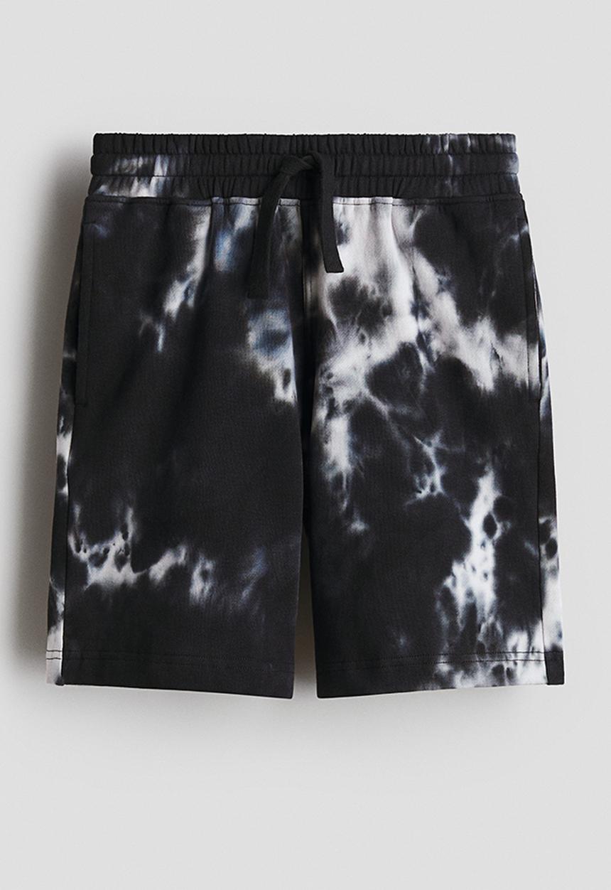 H&M - Printed sweatshorts - black/tie-dye