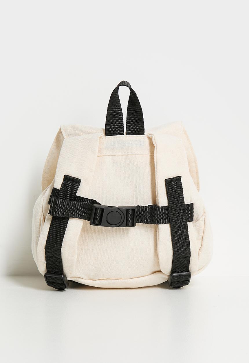 Pop Candy - Floppy ear pup backpack - cream/black
