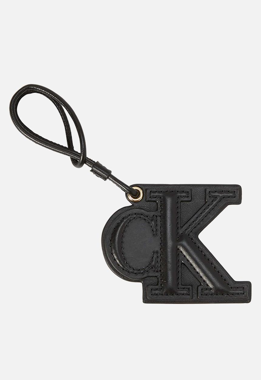 Calvin Klein - Deboss monogram patch bag charm - black