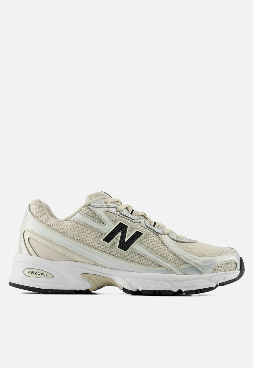 New Balance  - 740