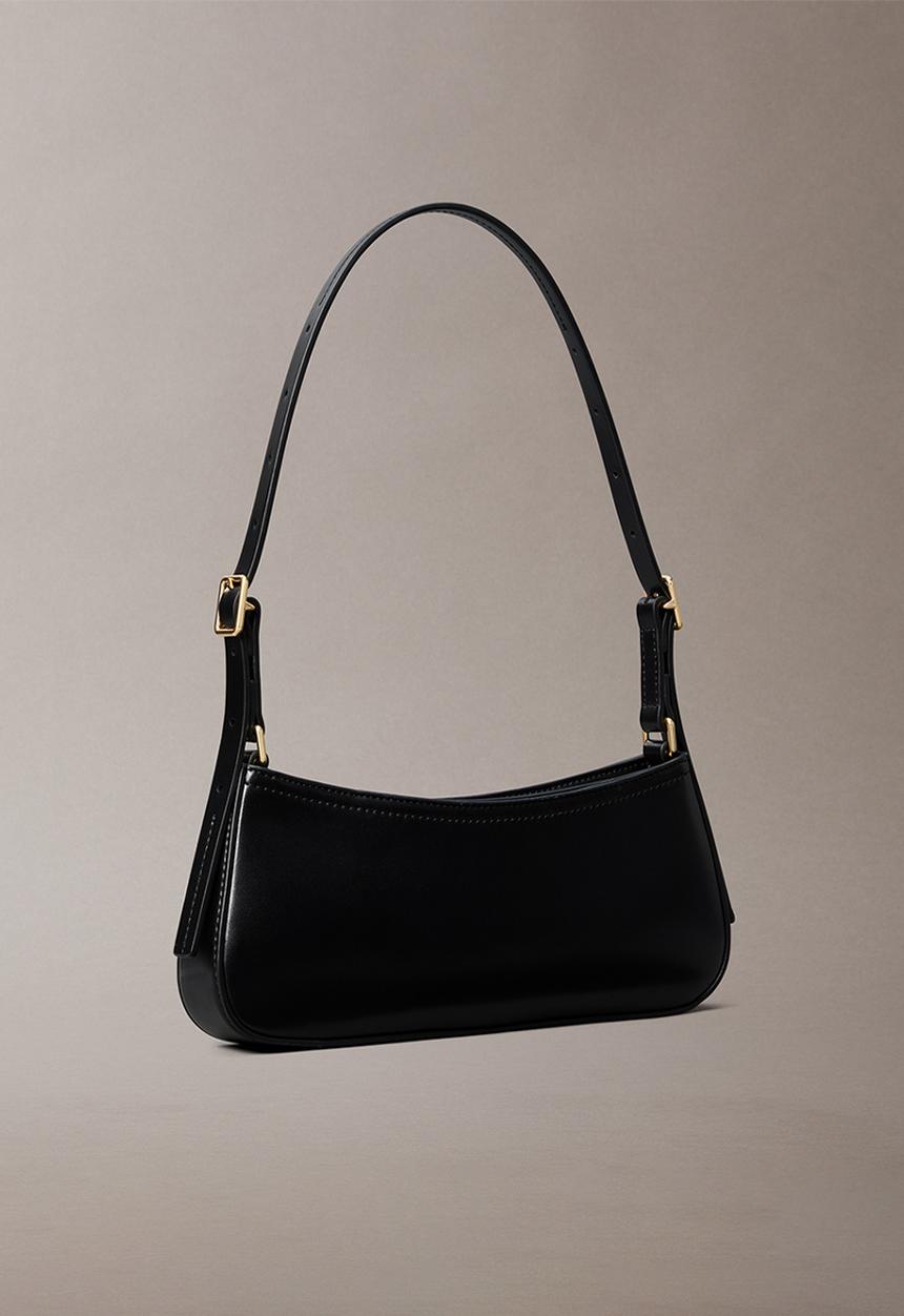 Calvin Klein - Ck small shoulder bag- black / antique light gold