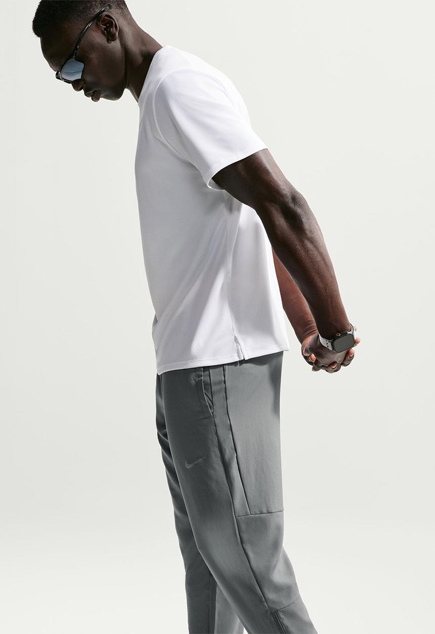 Nike - Challenger Dri-FIT woven pants - smoke grey/black/reflective silver