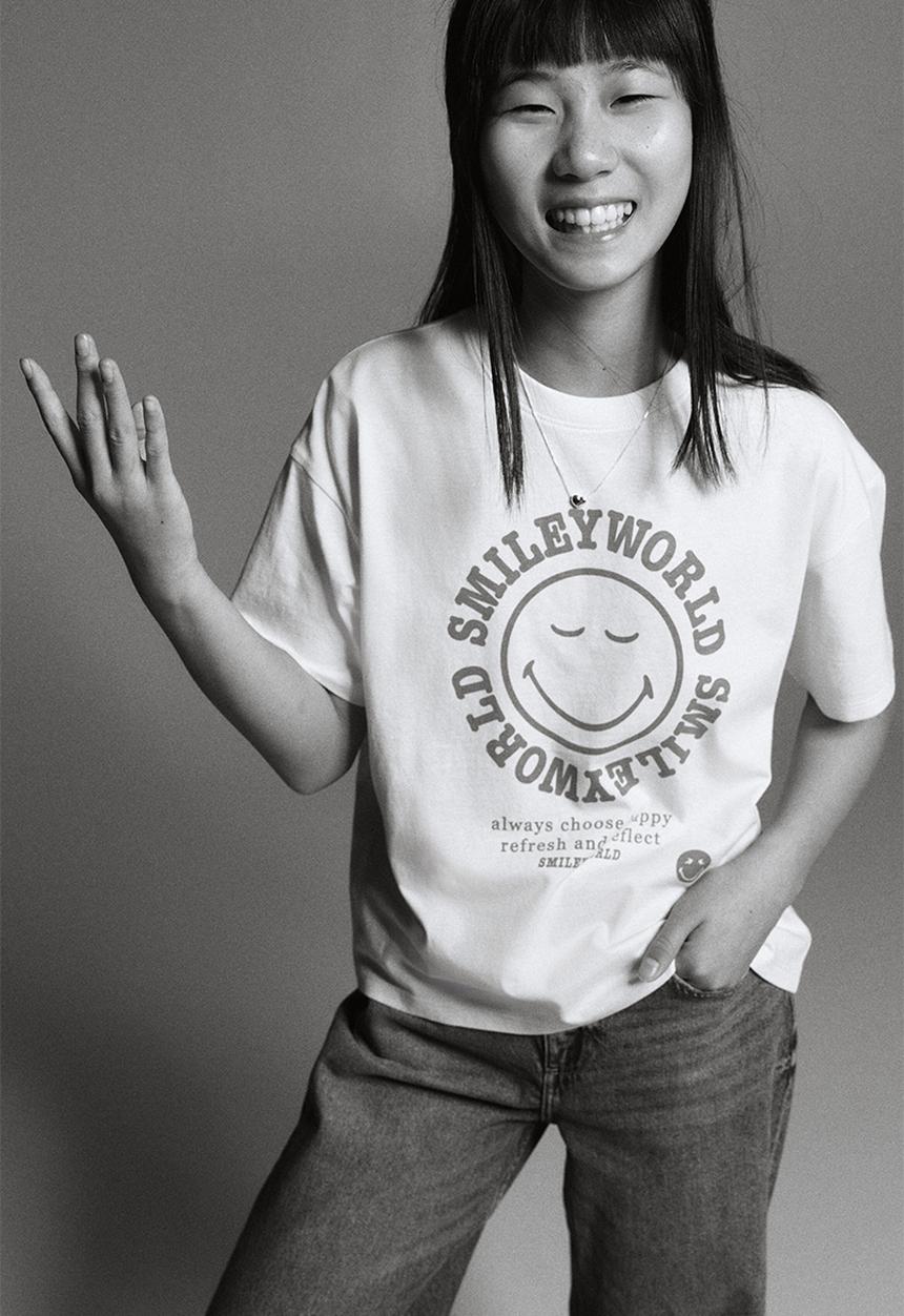 H&M - Printed cotton T-shirt - light yellow/smileyworld