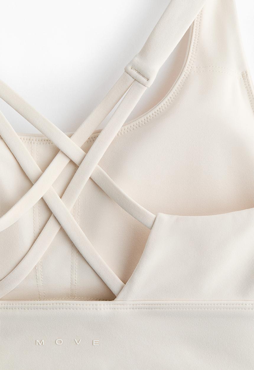 H&M - Medium support sports bra with softmove™ - ivory