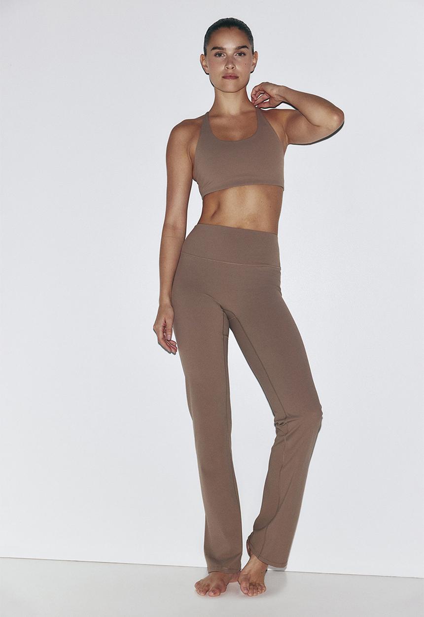 H&M - Sculptmove™ flared sports leggings - beige
