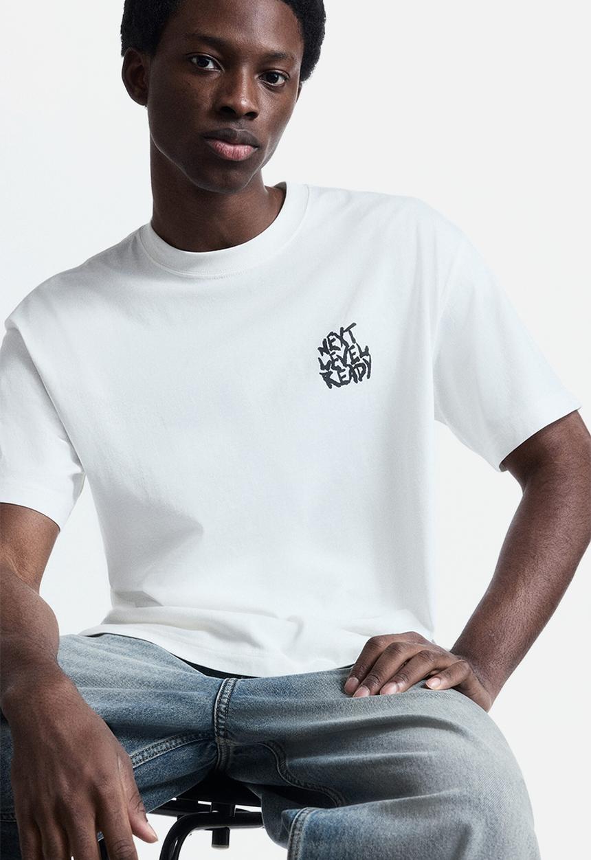 H&M - Loose fit printed t-shirt - white/next level ready