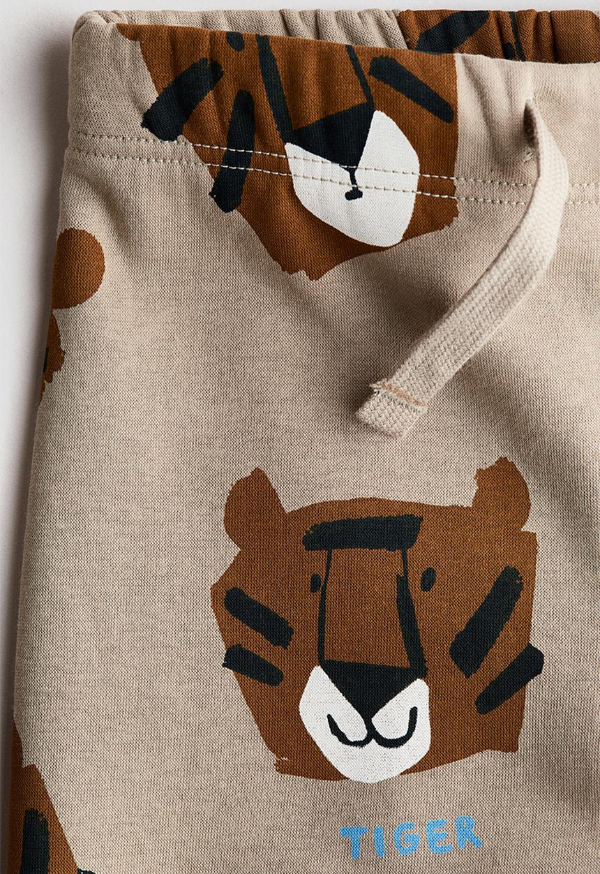 H&M - Printed joggers - beige/tigers