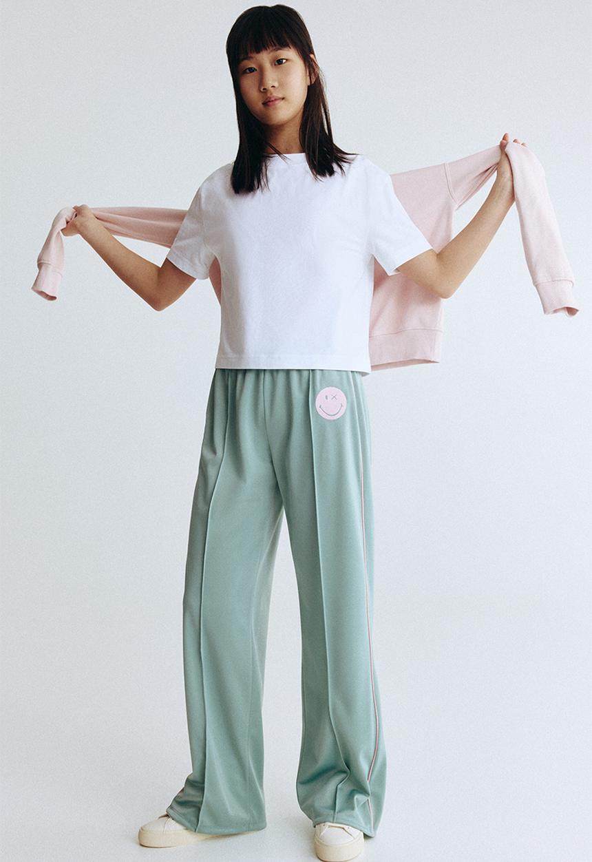 H&M - Wide-leg track pants - light green/smileyworld?