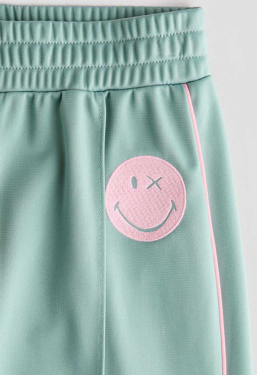 H&M - Wide-leg track pants - light green/smileyworld?