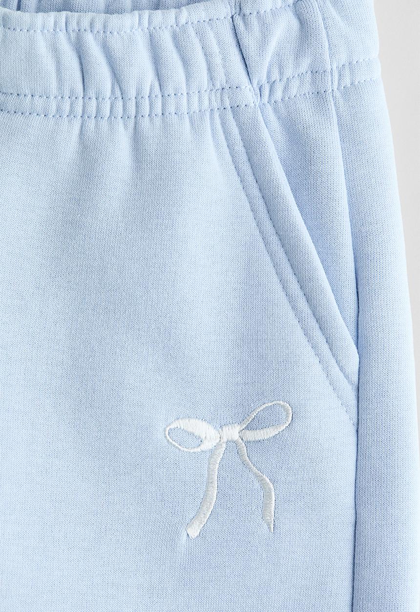 H&M - Straight sweatshirt joggers - light blue/bow