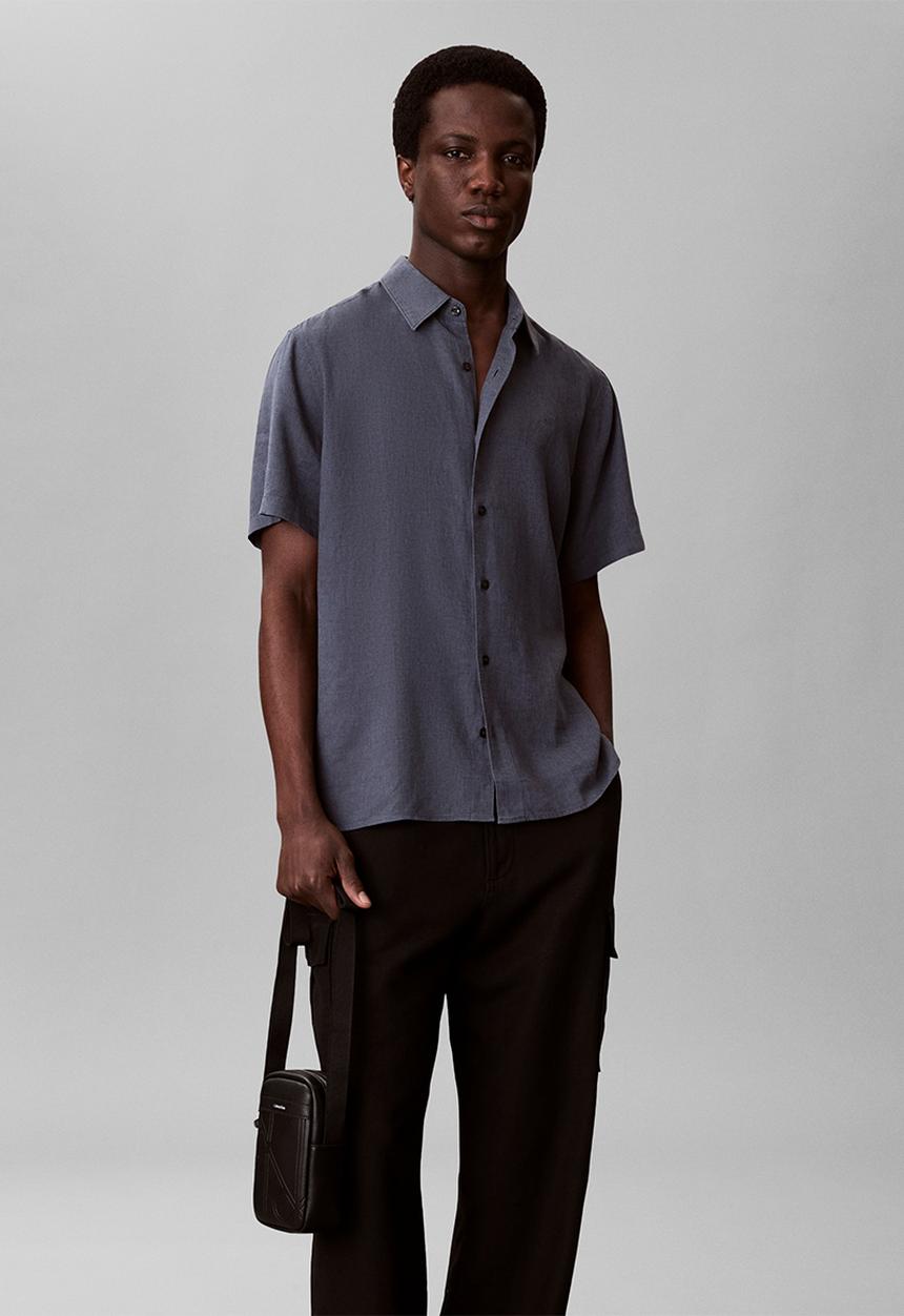 Calvin Klein - Emblem Aop Emboss Slim Reporter - Black