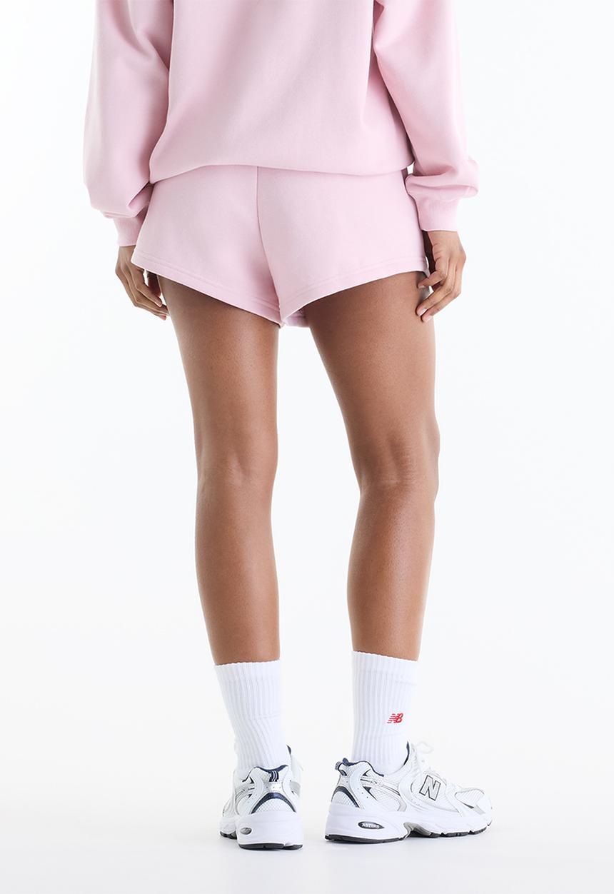 New Balance  - New Balance Trackside French Terry Short - Pink Chalk