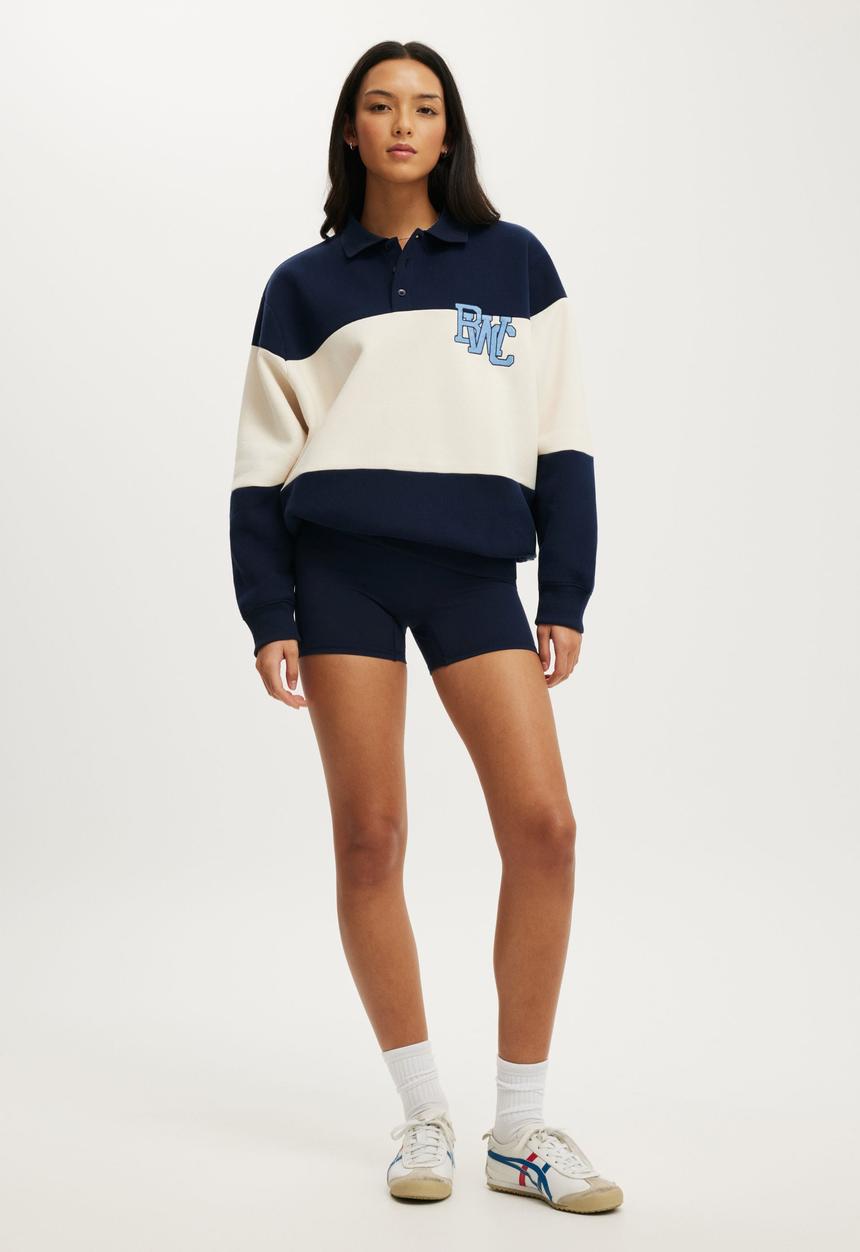 Cotton On - Plush Graphic Rugby Sweatshirt - Prep Sport Navy/Bwc