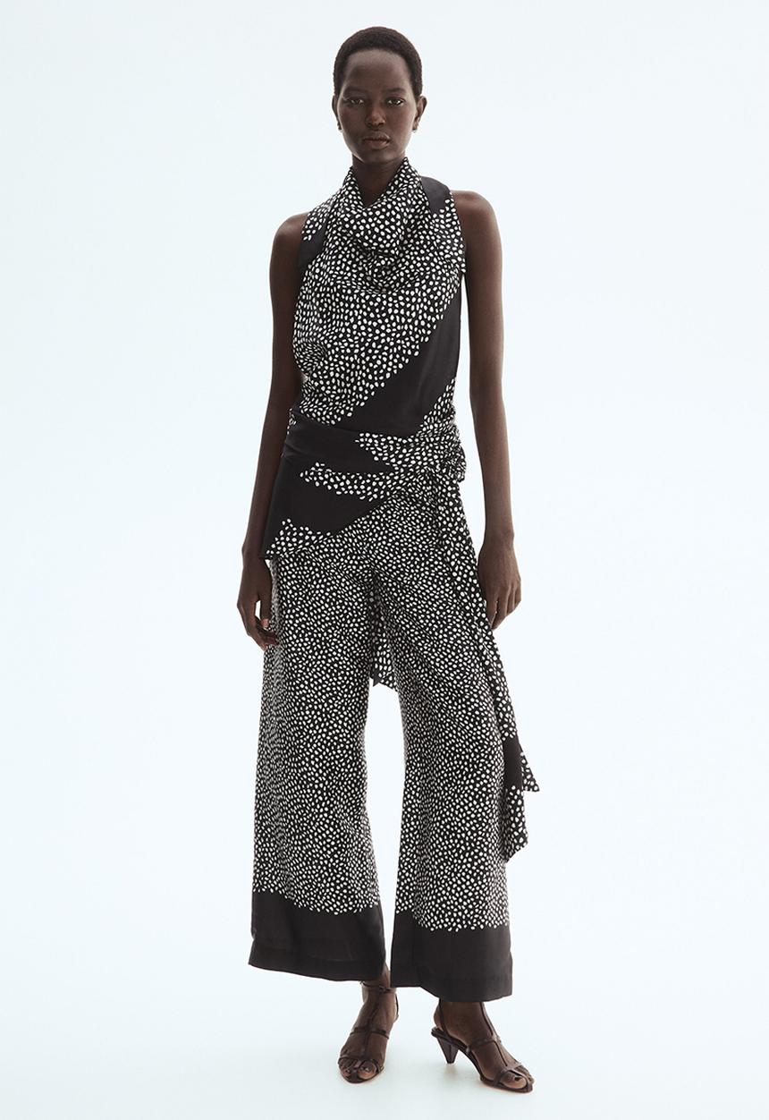 H&M - Skirt-layered trousers - black/spotted