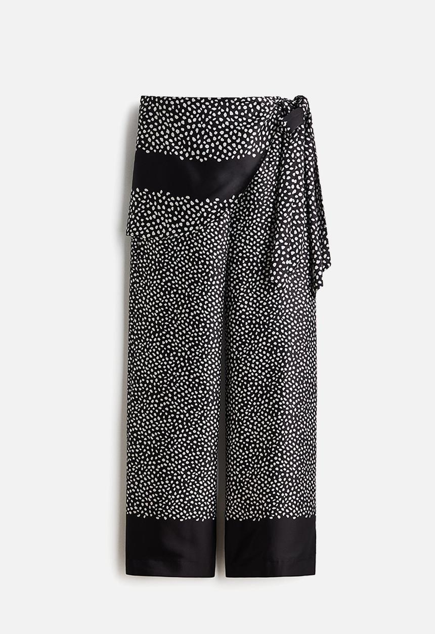 H&M - Skirt-layered trousers - black/spotted