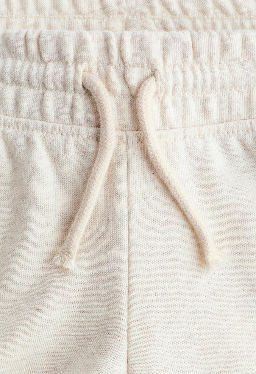 H&M - Flared joggers - light beige marl