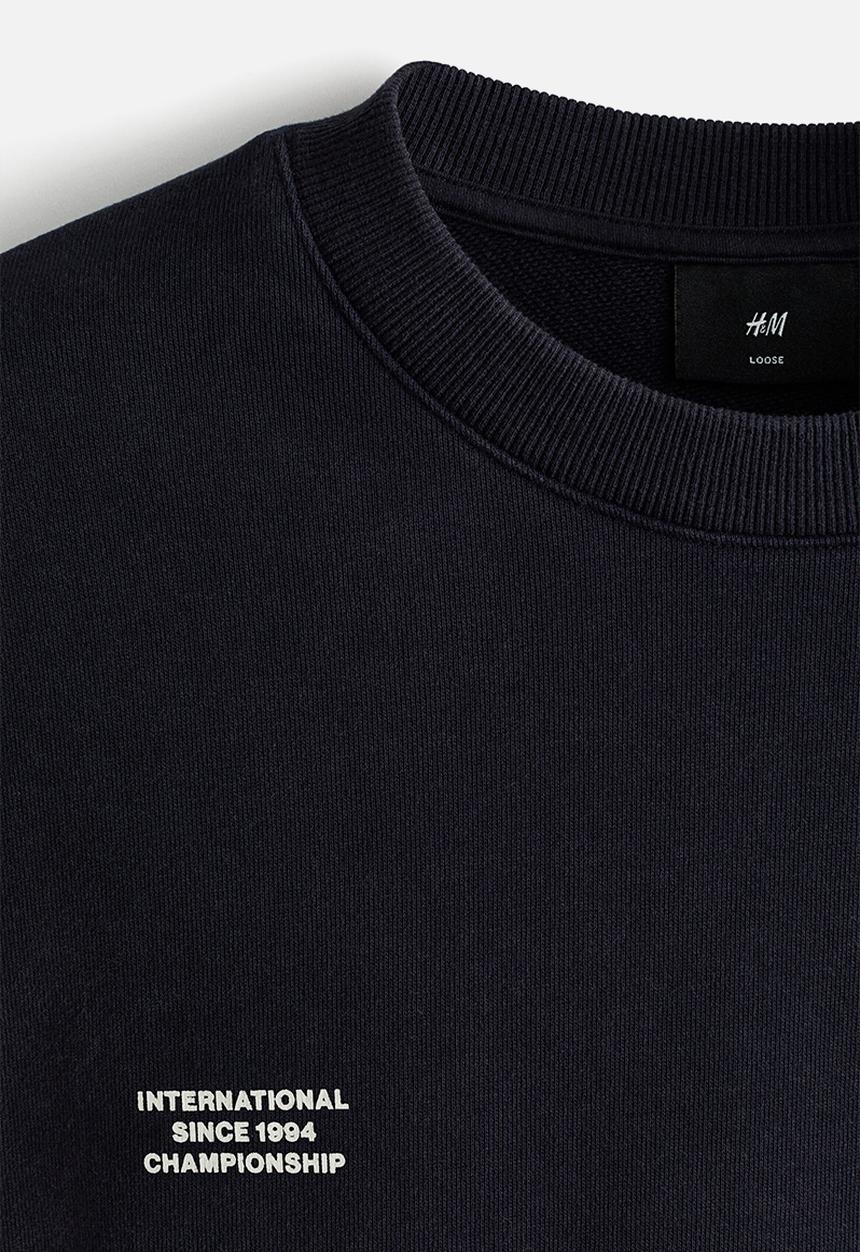 H&M - Loose fit printed sweatshirt - dark blue/intl. 94