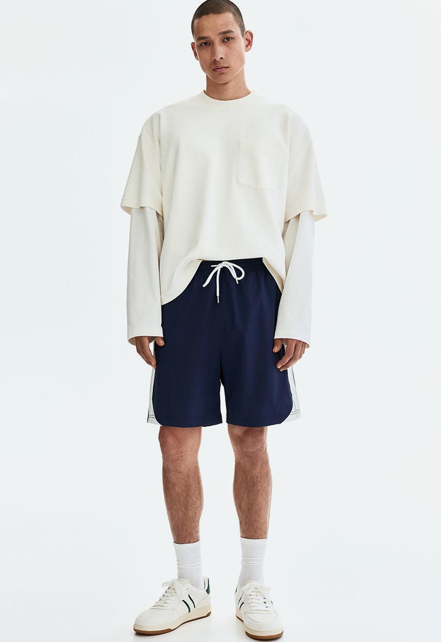 H&M - Regular fit track shorts - navy blue/white