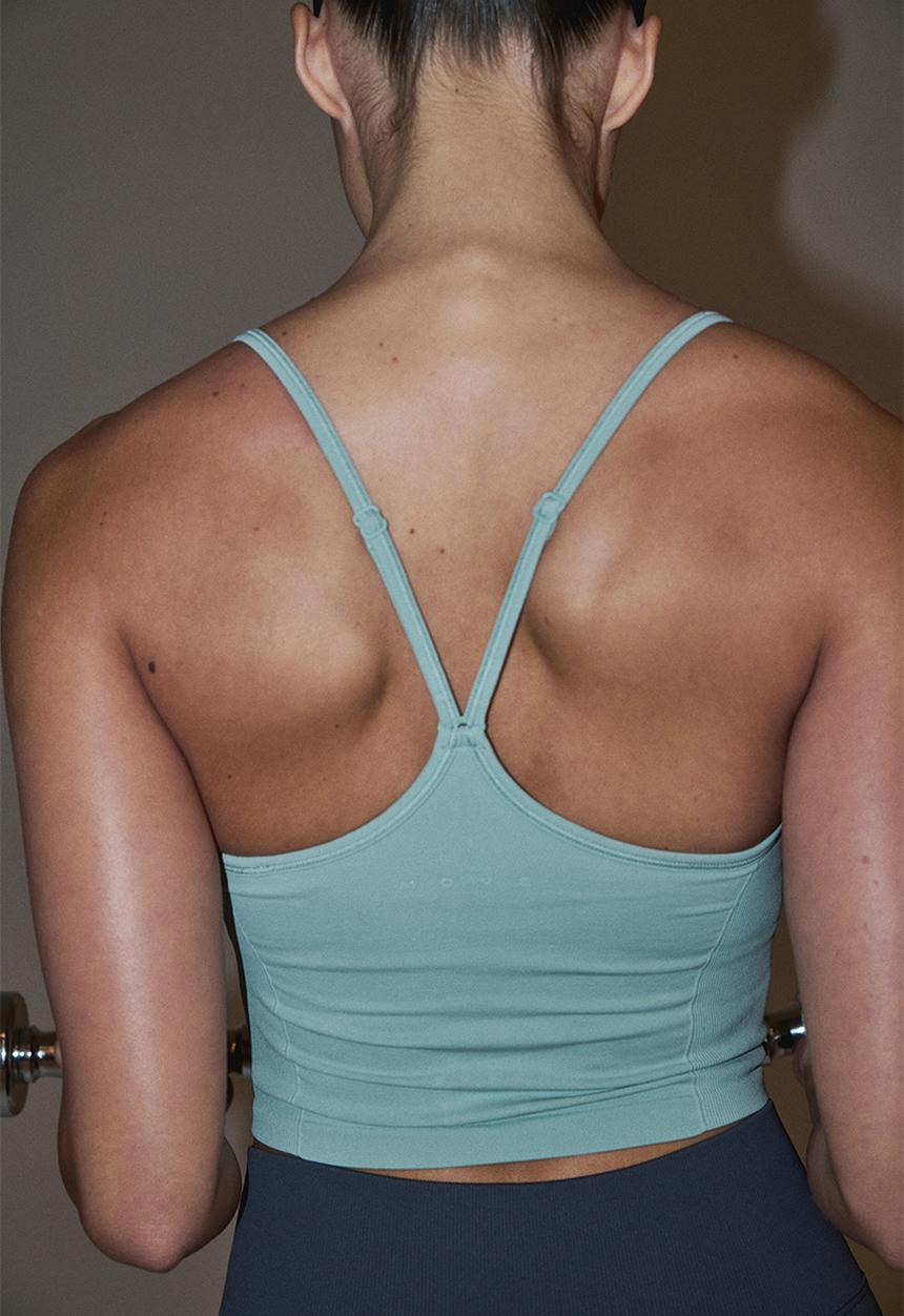 H&M - Seamless sports top with drymove - light turquoise