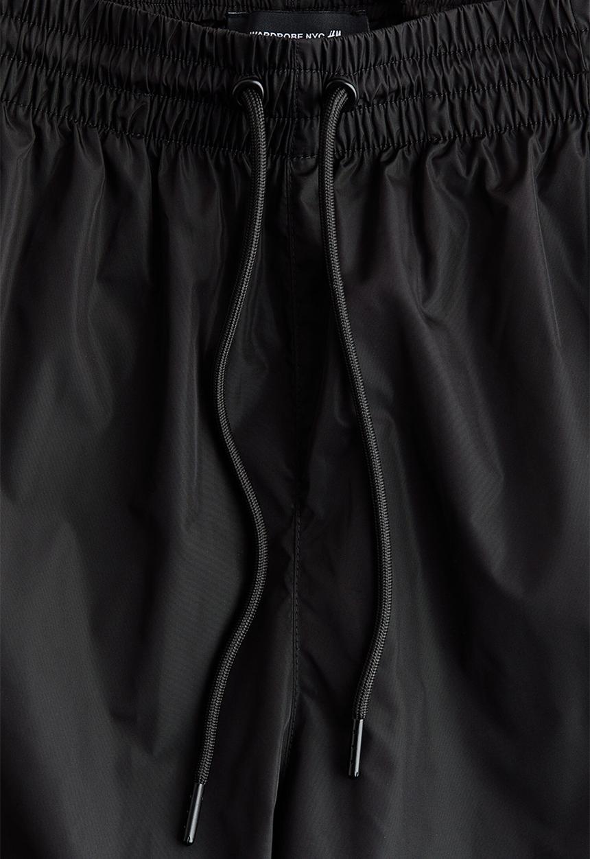 H&M - WARDROBE.NYC H&M:  Nylon track pants - black