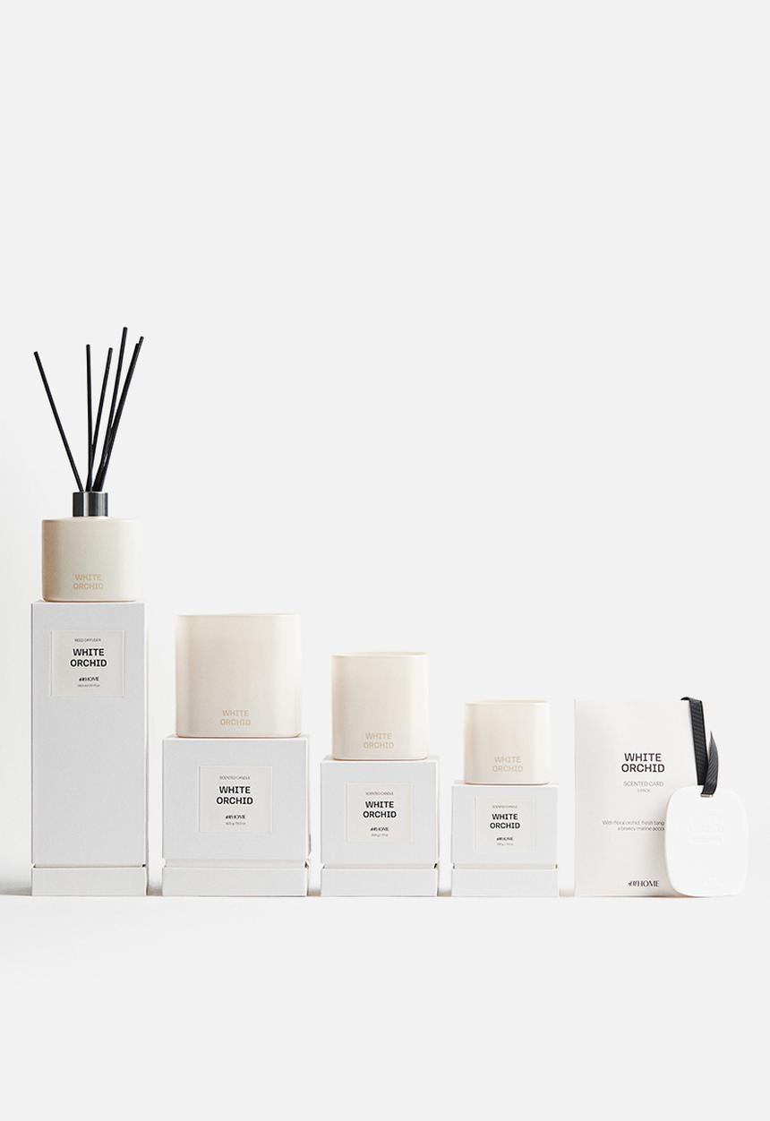 H&M - Scented candle in glass holder - white orchid