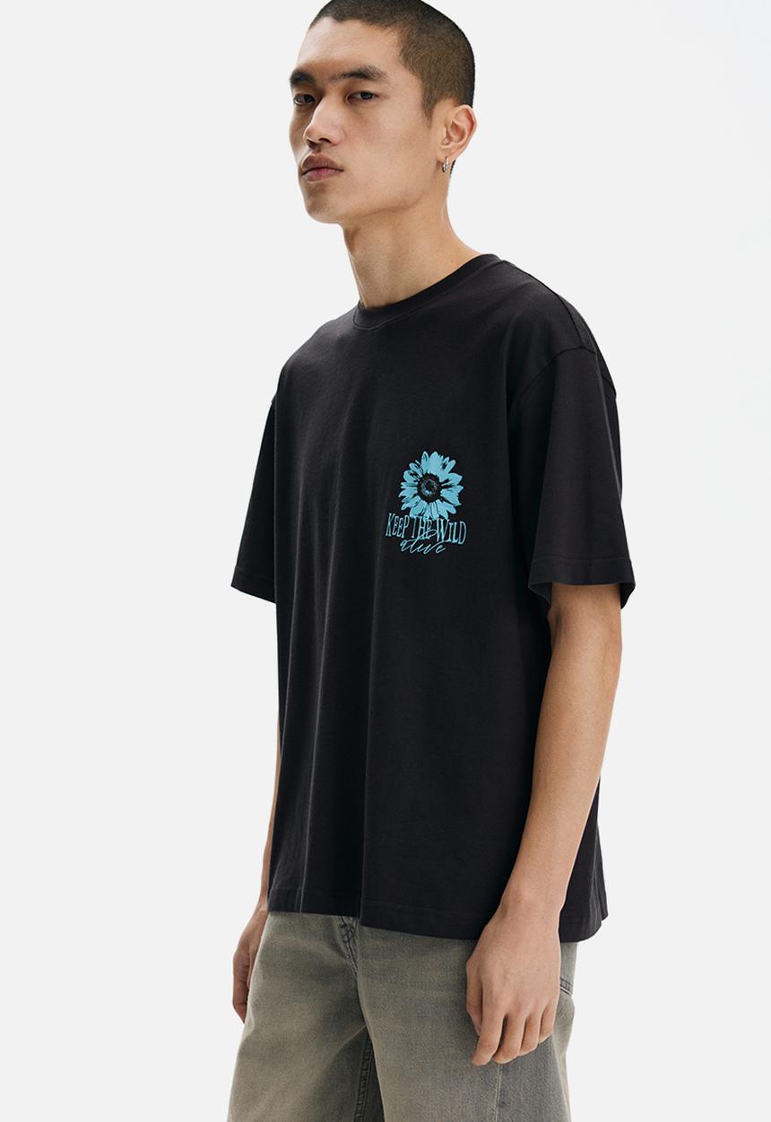 H&M - Loose fit printed t-shirt - black/keep the wild