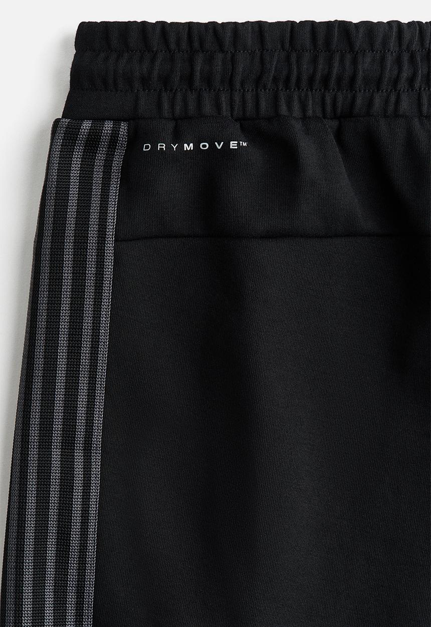 H&M - Loose fit sports joggers with drymove? - black
